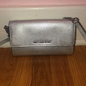 Micheal Kors silver cross body purse NWOT